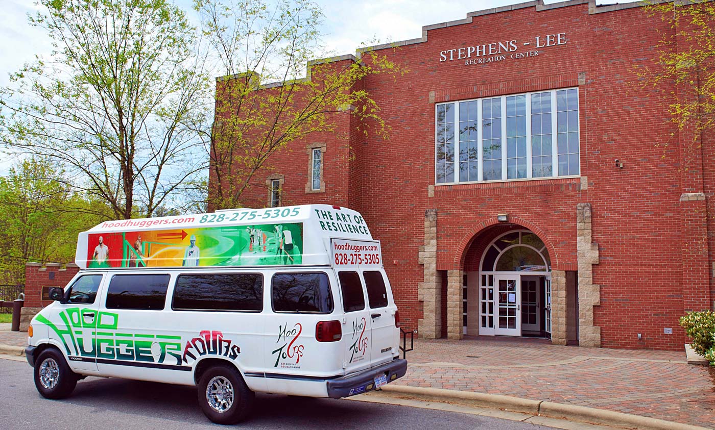 Hood Huggers tour van outside the Stephens-Lee Recreation Center
